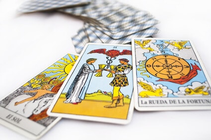 divination and prediction three Tarot cards the best choice, love, money and luck on a white background